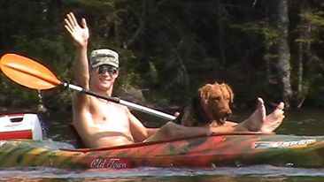 A family kayaking trip in "The Still-water" in the lower Northwestern reaches of the Adirondack Mountains. Drake Paddles along with his then 1 year old Airedale, Jazmyn.